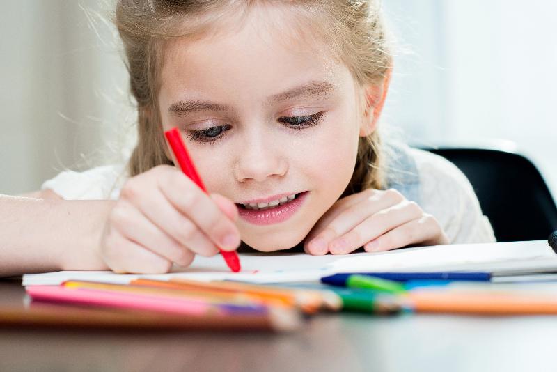 little girl coloring