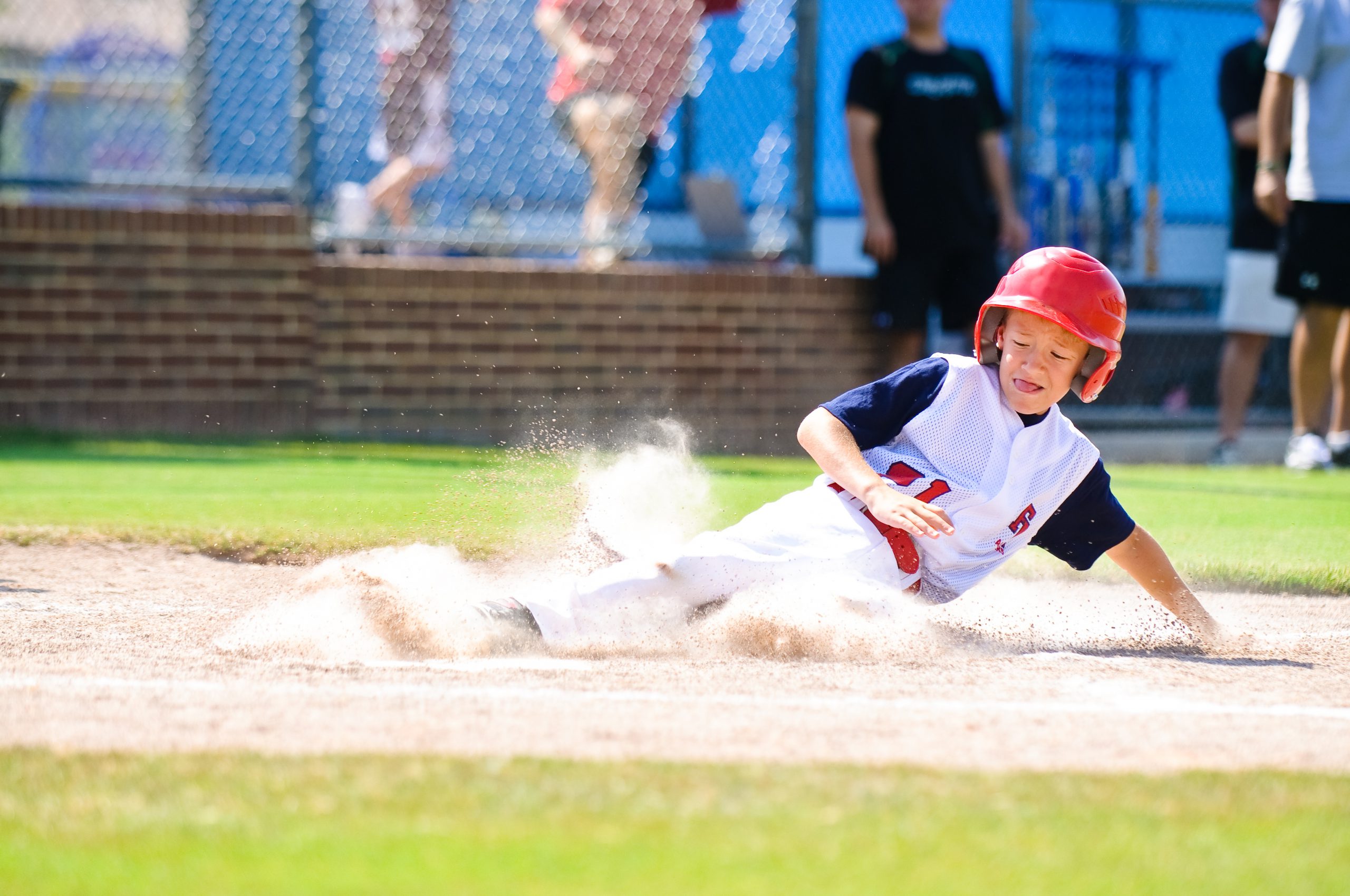 kid sliding into base (baseball)